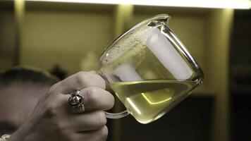 Pouring a Liquid in a Laboratory Setting Requires Precise Measurement and Safety Precautions. Media photo