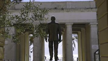 Bronze statue of sandro pertini overlooking the ligurian sea in savona. Action photo