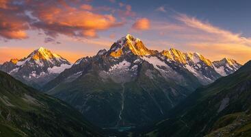 Mountain Range Landscape with Snow Capped Peaks at Colorful Sunrise photo