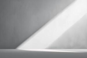 Light beam illuminating empty space in a minimalist room with gray walls, creating a serene atmosphere for artistic expression and inspiration concept photo