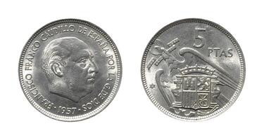 Five Pesetas 1957, Coin from Spain, the coin shows Head of Francisco Franco facing right and Coat of arms of Spain with the eagle of Saint John on flight, It's made of Copper nickel photo
