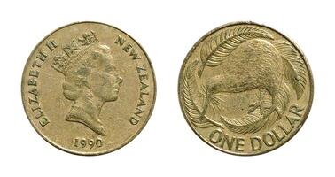 One Dollar 1990, Coin from New Zealand, the coin shows the crowned bust of Queen Elizabeth II, facing right and a kiwi facing left in the centre, It's made of Aluminium Bronze, two sides of the coin. photo