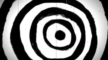 A black and white image of a circular pattern video
