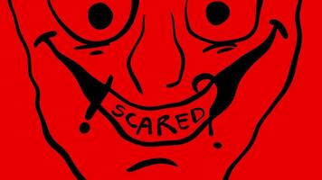 A cartoon face with the words scared written on it video