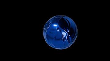 A blue shiny object on a black background video