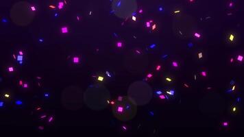 Falling multi-colored confetti particles glow beautifully. Mesmerizing bokeh effect. Colorful abstract background 4K, seamless loop. video
