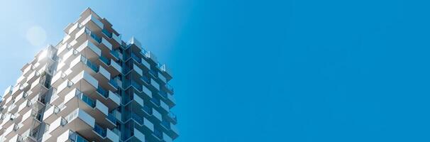 Modern building with blue sky background 3d rendering photo