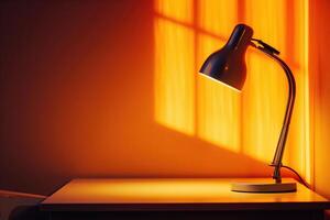 A lamp is on a table with warm light photo