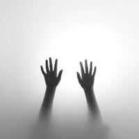 Two hands of man are shown in a blurry image photo