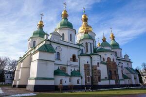 Saint Sophia Cathedral, a remarkable orthodox cathedral in Kyiv Ukraine, showcases stunning architecture with its golden domes and intricate details, attracting visitors and worshippers alike photo
