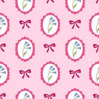 Seamless pattern of bell flowers in oval frames and bows. graphics. vector