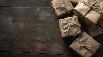 A pile of wrapped presents on a wooden table photo