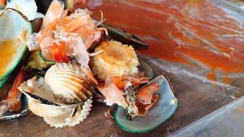 Seafood with spicy sauce photo