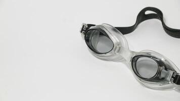 Goggles for swimming isolated on white background photo