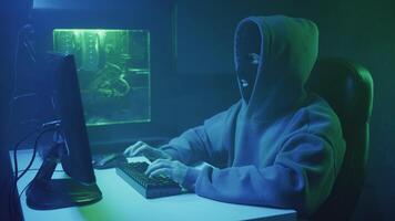 Cybercriminal hacker typing and showing don't know gesture to camera video