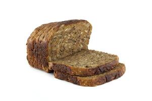 Rustic loaf of sliced multigrain bread with seeds on a clean white background for a healthy choice photo