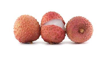 Close-Up of Fresh Lychee Fruits With One Partially Peeled Showing Flesh photo