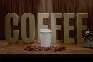 mockup of a paper coffee cup standing on a wooden table and surrounded by coffee beans and a light shining on it from above photo