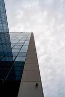 Glass Tower with Sky Reflection in Modern Architecture photo