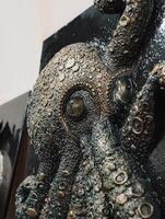 A detailed octopus sculpture with captivating textures and design, making it a remarkable art piece photo