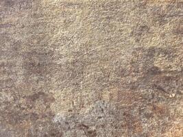 Rustic brown stone texture with natural patterns photo