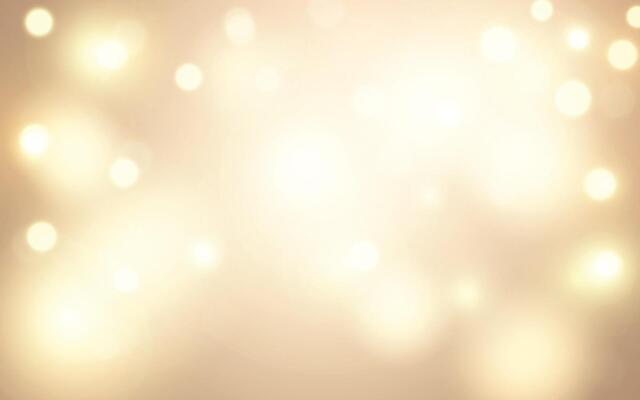 Soft Golden Bokeh Light Abstract Background. Warm glowing blur with dreamy festive atmosphere. Backgrounds decoration