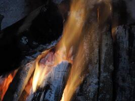 cracking fire in fireplace detail photo