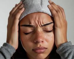 The Morning After Painful Hangover Captured in Closeup Photo