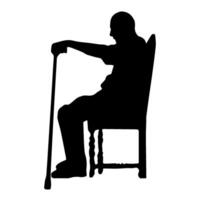 Man sitting and holding a cane in silhouette vector
