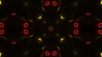 Yellow flower with red circles around it on black background. Kaleidoscope VJ loop video