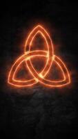 Fiery Celtic Trinity Knot symbol flaming on a dark stone background. Mystical elemental energy concept. Vertical animation. video