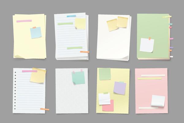 paper lists with a lot of stickers