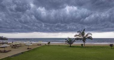 Dramatic timelapse of fast moving thunderstorm clouds sweeping across a tropical coastline 1 video