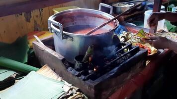 Traditional Indonesian Satay Stall with Banana Leaves used to wrap satay or as a base on serving plates video