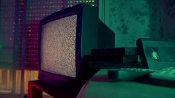Vintage CRT TV with Static and VHS Tapes in Retro Room in Analog Style video