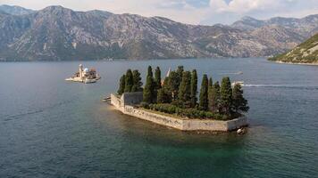 Aerial view of St. George Island with the island with the church of our lady of the rocks. Tourist attraction of the ancient monastery on the island near Perast, in the Bay of Kotor, Montenegro photo
