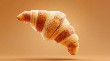 Freshly baked croissant floating on a warm orange background photo