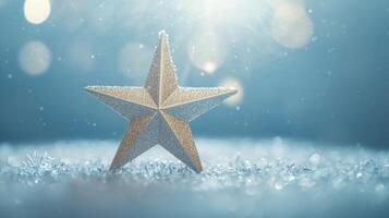 A sparkling gold star rests on a snowy surface, capturing the essence of winter's enchantment photo