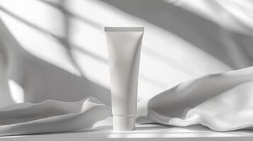 Minimalist skincare product displayed elegantly on soft fabric with dramatic shadows playing around photo