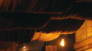 Cozy Dimly Lit Interior with Draped Fabric video