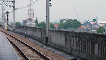 Overcast Railway Platform with Train Tracks video