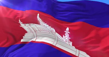 Cambodia flag waving at wind in slow with blue sky loop video