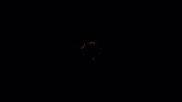 Burning effect from the center of the background. Burning hole. Burns from the center. Burning paper effect. Alpha channel 4K video