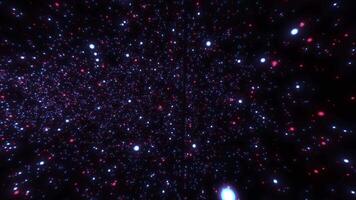 Background from particles in space. animated particles of two colors with a glowing effect video