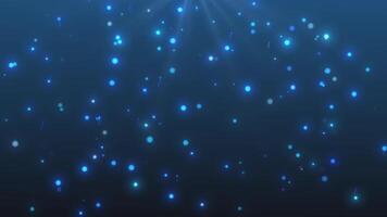 Multi-colored glowing blue particles on a blue background with a ray of light at the top video