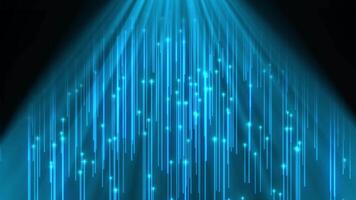 A stream of particles moving upward along a beam of light. Lines of particles. Star particles. Particles on a black background video