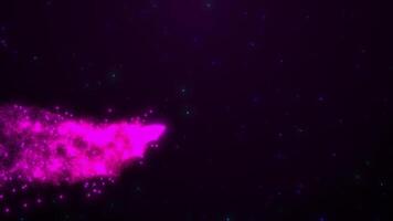 A stream of flying particles forming a residual effect. Colorful particle background. Wave of particles. Night space sky video