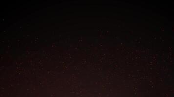 Animated coal particles. Fire Sparks on black background. Fire embers glow. Abstract Particles Background with animation of moving glow orange particles video