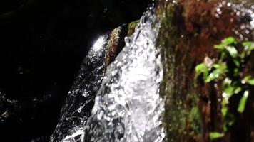 Close-Up of a Waterfall with Sunlight Reflection video