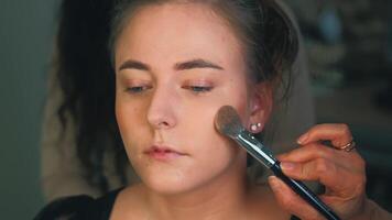 A creamy texture is applied across the chin. The skin brightens with each movement. Glow builds from within video